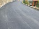 Nelle foto l'asfalto appena rifatto sulla strada verso Bussana Vecchia