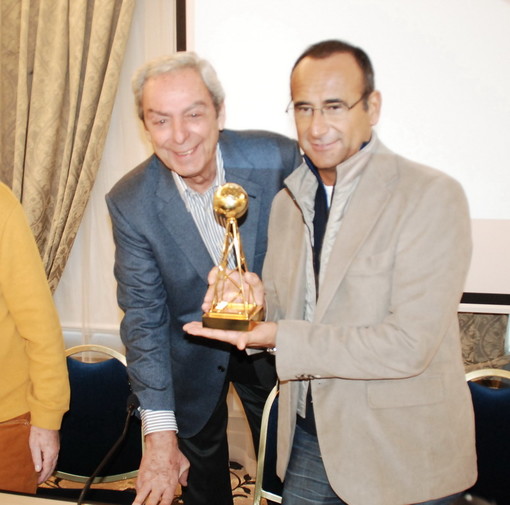 Da sinistra Daniele Piombi e Carlo Conti durante la presentazione del Premio Regia Televisiva del 2010