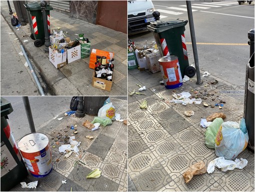 I rifiuti abbandonati ogni giorno sul marciapiede di via Roma