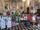 Sanremo: il parroco di San Giacomo Don Antonio benedice gli zainetti dei bambini e dei ragazzi