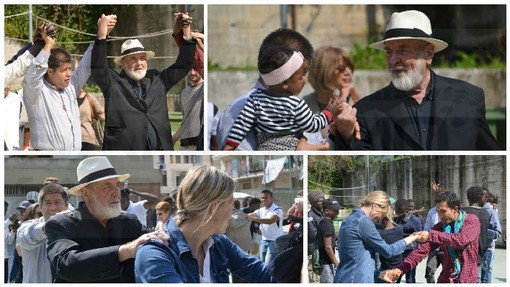 Ventimiglia: chiesa delle Gianchette in festa per l'arrivo del Maestro Pistoletto, i migranti lo accolgono a suon di djembe e lo invitano a ballare (Foto e Video)