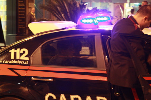 Sami Mastouri mentre viene portato via dai Carabinieri